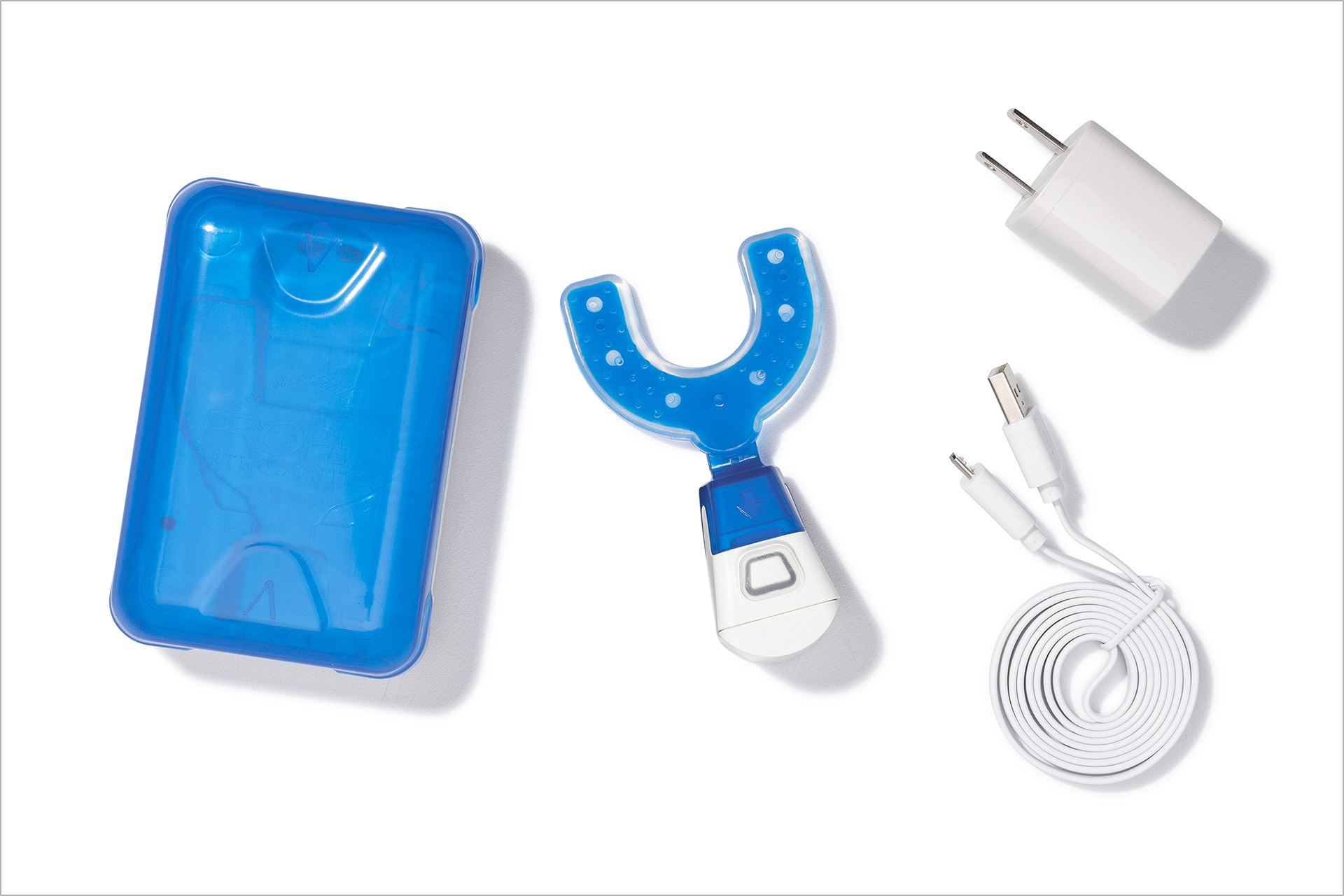 Propel Orthodontics' VPro+™ device with charging case and cord