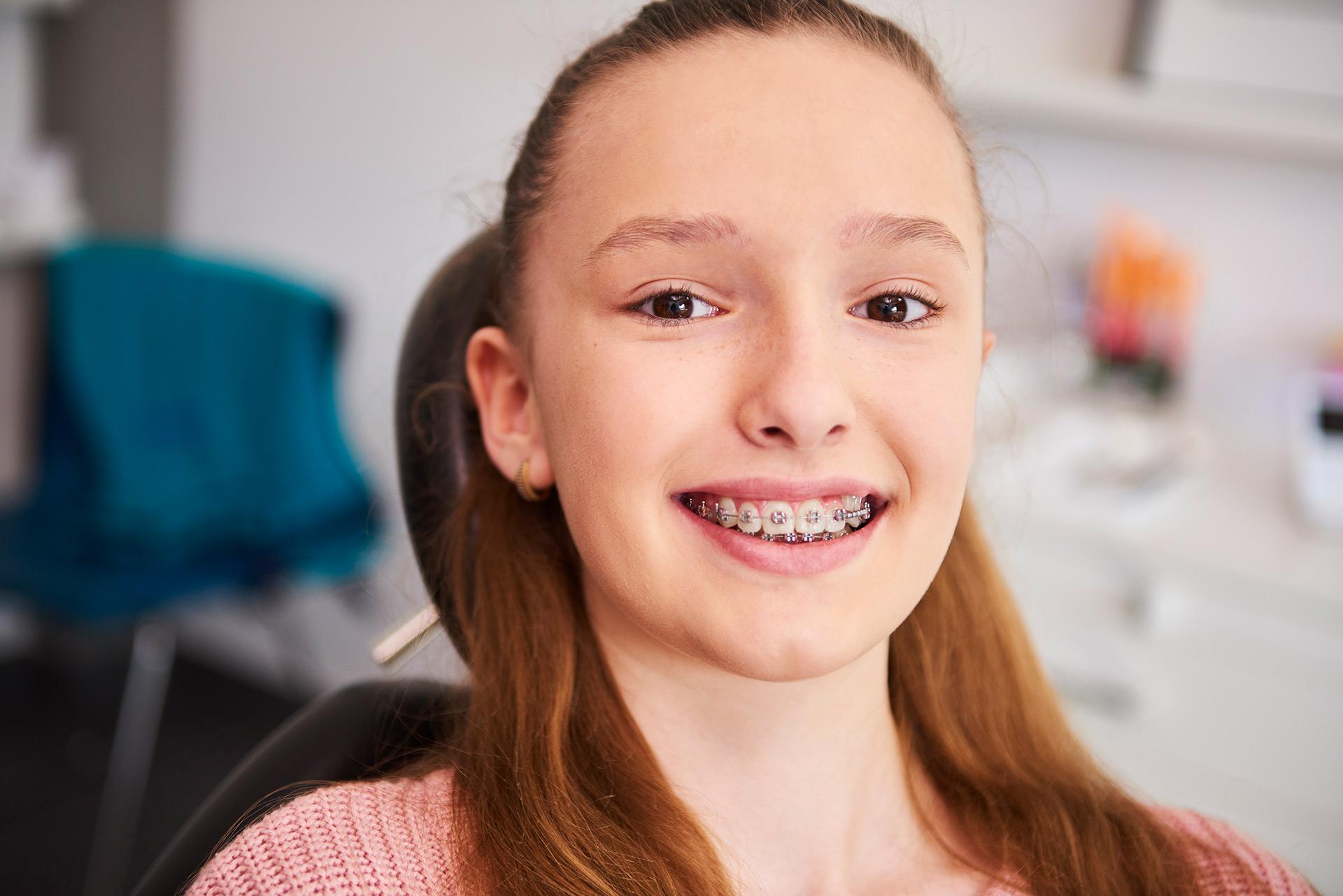 Young girl from San Marino at an appointment for her braces